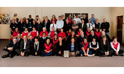 The Campus Services team with the Hospitality Assured plaque