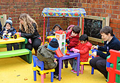 Children at Alexandra Road Community Day Nursery enjoying the new play area
