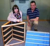 Dr Richard Bonser and Alice Lightowlers with roof models