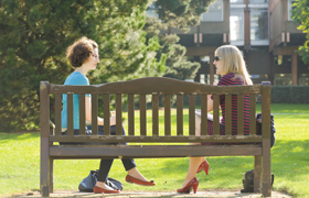 Two people on a bench