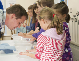 Dr Ben Neuman with children from Coombes C of E Primary School