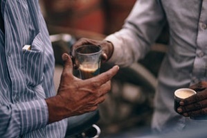 Indian men drinking coffee