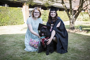 Graduate Daisy, with her sister Hollie and Boris the dog
