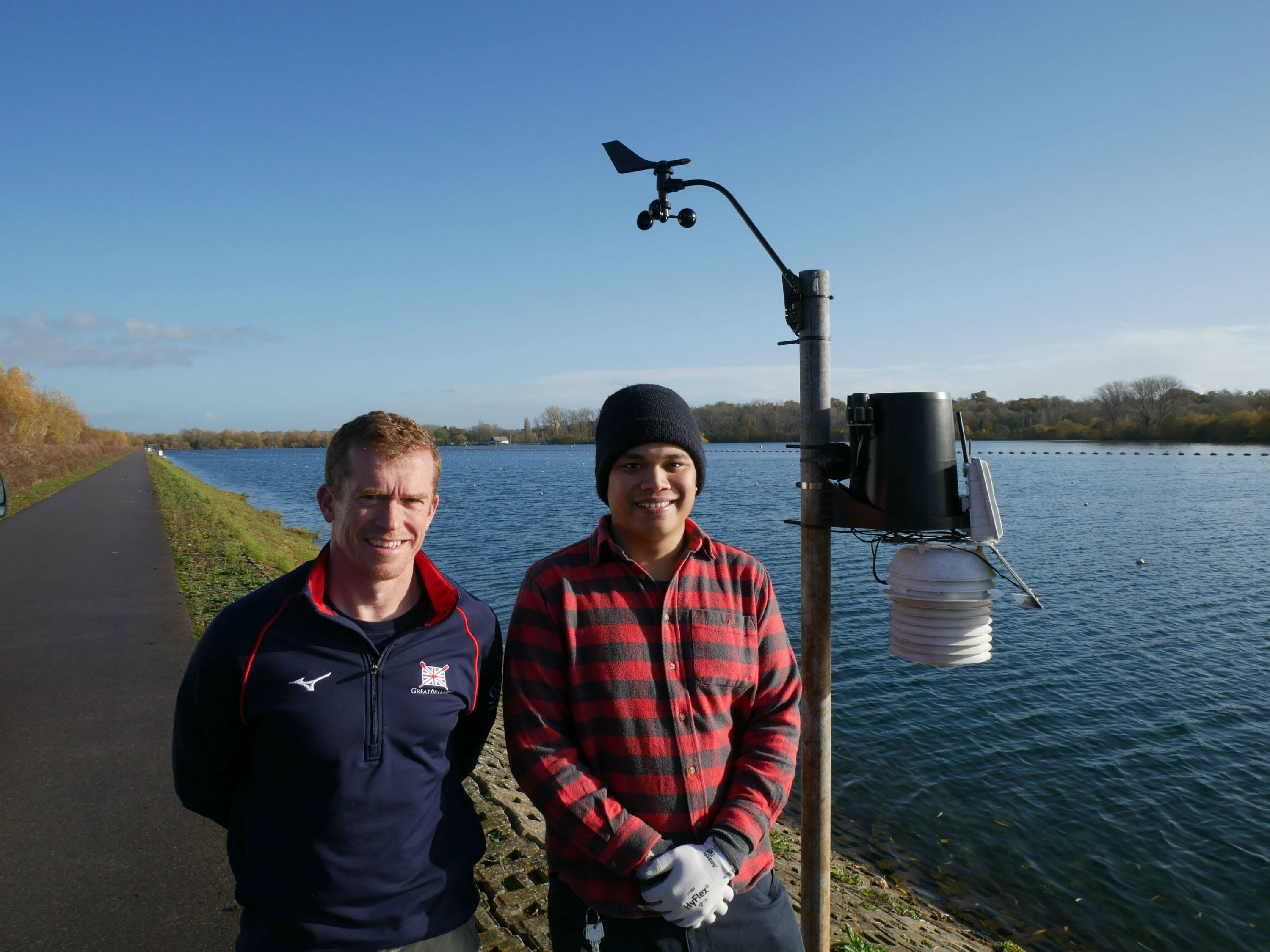 Cahyo Leksmono, IT technician at the University of Reading, and Mark Homer, Head of High Performance Science and Medicine at British Rowing, next to the newly installed weather station