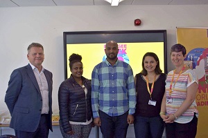 Two attendees to the Refugee open day with Pro-Vice Chancellor Robert Van De Noort, RUSU Diversity Officer Leen Al Najjab and Diversity Dean Prof Ellie Highwood