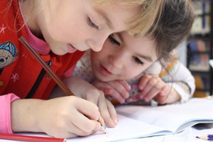 Primary school children studying