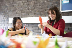 Students trying origami