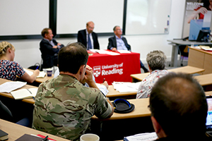 Army officer listening to University of Reading military showcase