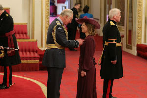 Professor Hannah Cloke receives her OBE from HRH Prince Charles