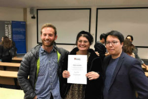 Meggie Copsey-Blake with her UROP award and Tom Walters (L) and Dr Billy Wong (R)