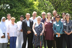 Lord Bourne and members of local faith groups