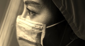 Healthcare worker wearing a face covering