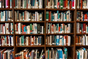 Research books and papers in a library