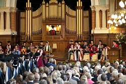 Colour photograph of graduation in great hall
