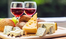 colour photograph of cheese and wine