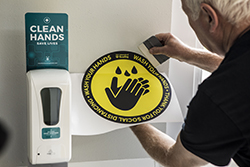 Clean hands sign being installed